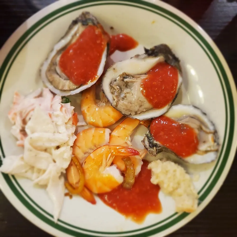 Peel N Eat Shrimp Raw Oysters and Crab Salad